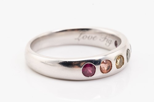 Lot 131 - A rainbow sapphire ring in 18ct white gold,...