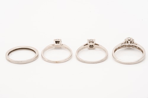 Lot 137 - A seven stone diamond cluster ring, to diamond...