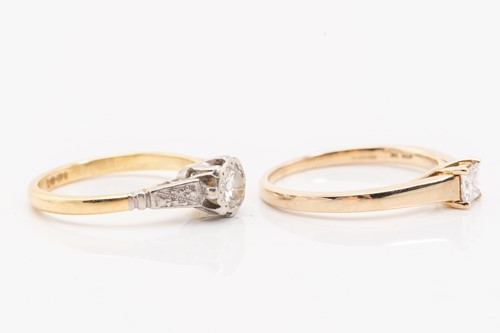 Lot 11 - Two single-stone diamond rings, the first...
