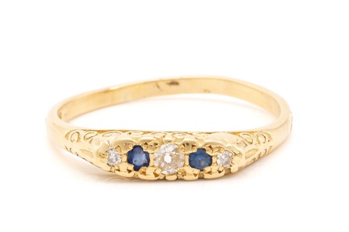 Lot 132 - An 18ct yellow gold, sapphire and diamond half-...