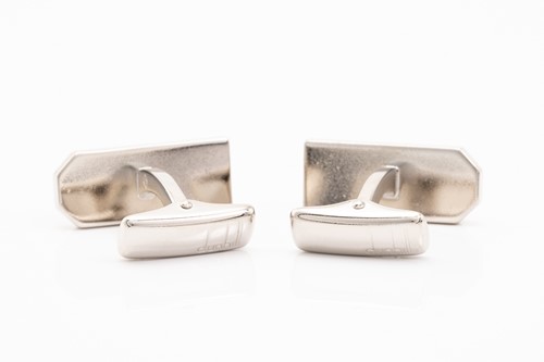 Lot 102 - A pair of Mappin & Webb silver cufflinks, a...