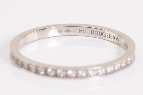 Lot 119 - Boucheron. A diamond and platinum full hoop...