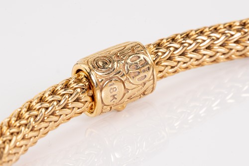 Lot 88 - An 18k yellow gold and diamond classic...