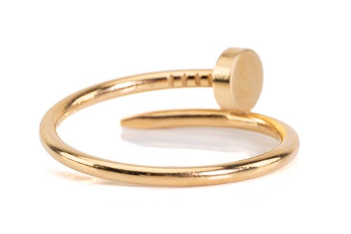 Lot 86 - Cartier - a Juste en Clou ring in 18ct yellow...
