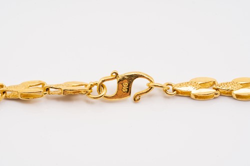 Lot 236 - A fancy chain necklace, comprising flat rolled...
