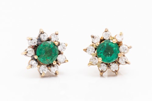 Lot 8 - A pair of yellow metal, emerald and diamond...