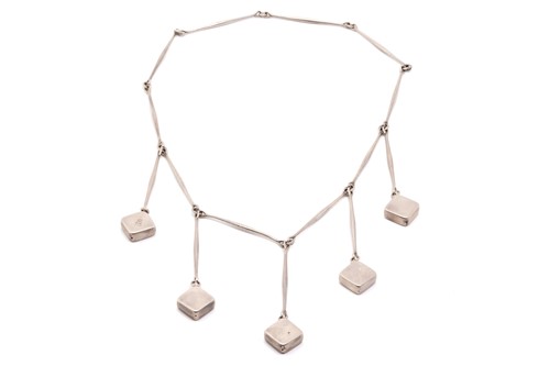 Lot 339 - Georg Jensen - A necklace of swollen rod form...