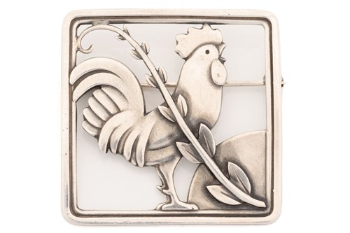 Lot 333 - Georg Jensen - A cockerel brooch, depicting a...