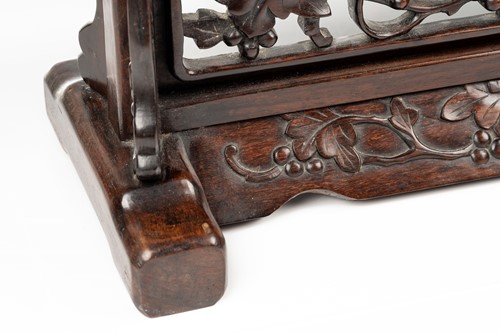 Lot 81 - A Chinese Hongmu table screen, late Qing, the...