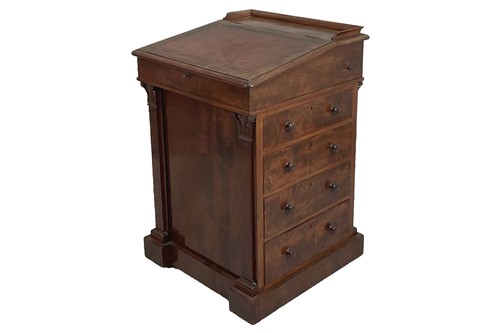 Lot 154 - An early Victorian mahogany Davenport desk...