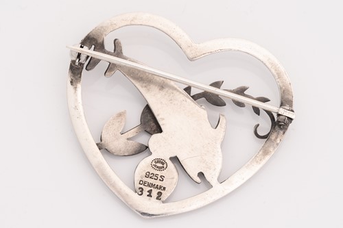 Lot 296 - Georg Jensen - a 'double dolphin' brooch,...
