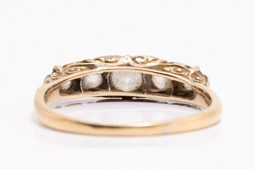 Lot 25 - A five-stone diamond half-hoop ring,...