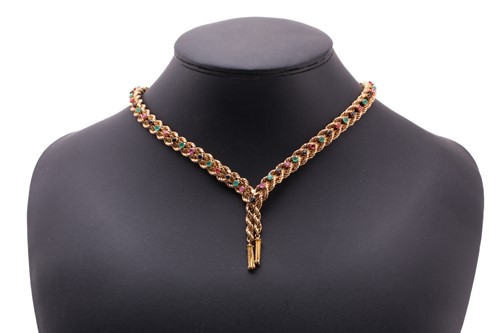 Lot 199 - A lariat-styled necklace set with gemstones,...