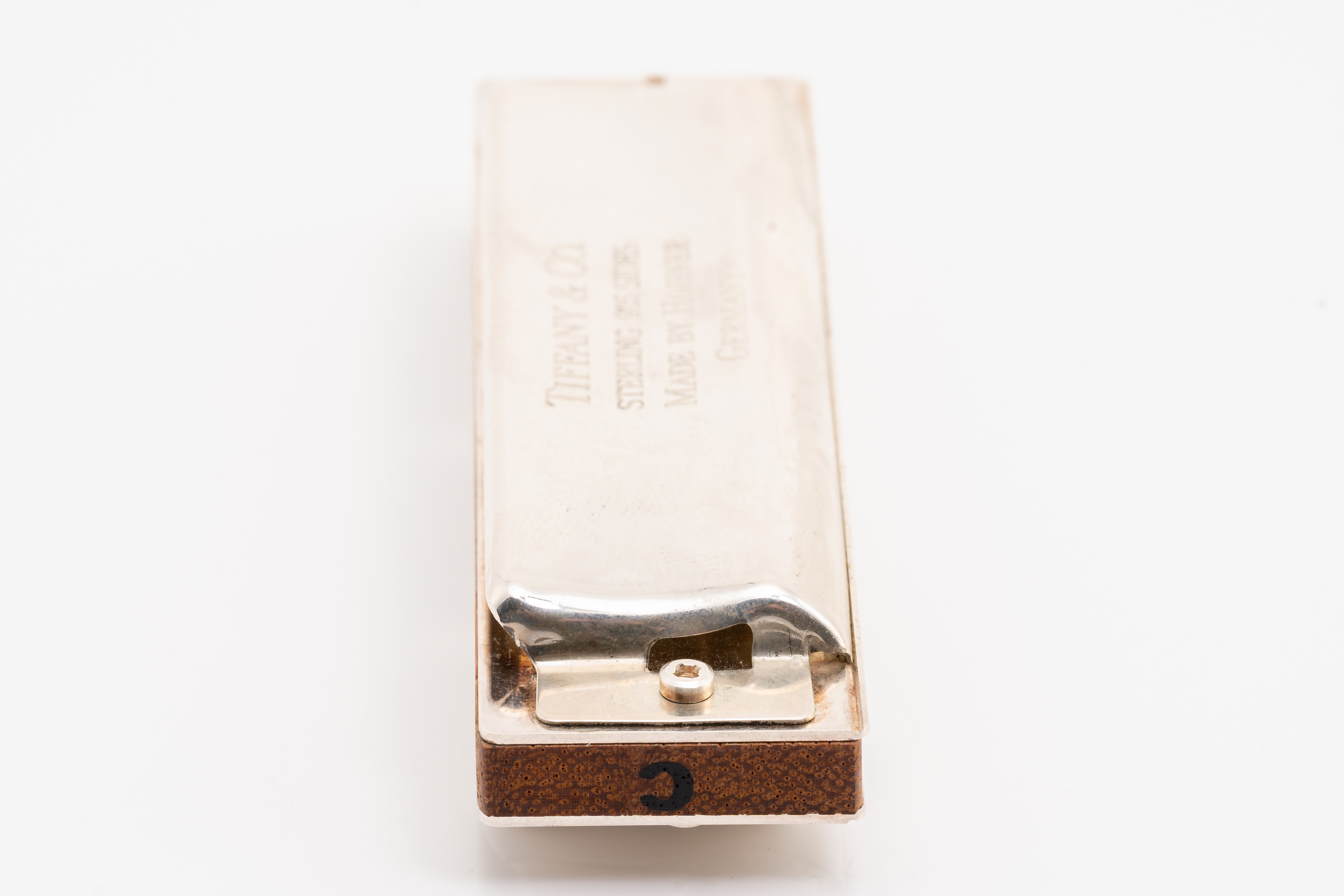 Lot 331 - Tiffany & Co. silver harmonica made by