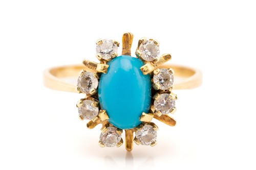 Lot 174 - A turquoise and CZ cluster ring, the oval...