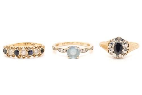 Lot 200 - Three gem-set rings in 9ct gold; including a...