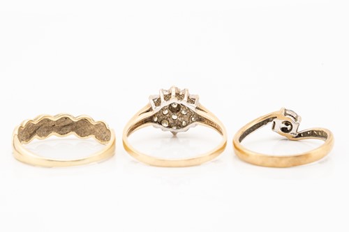 Lot 49 - three gem-set rings, including a diamond-set...