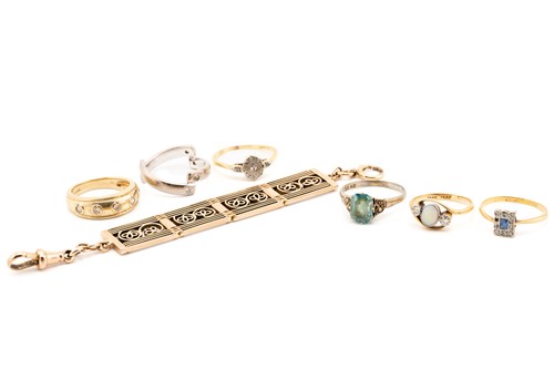 Lot 75 - A collection of six gem-set rings and a watch...