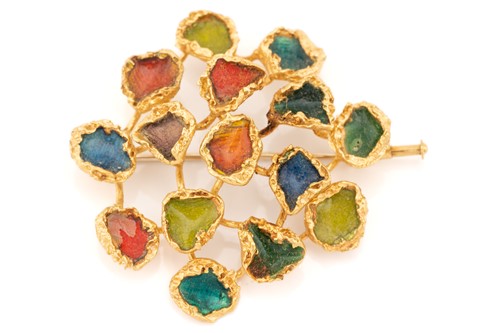 Lot 162 - A Modernist polychromatic enamel brooch of...