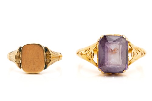 Lot 213 - A synthetic colour-changing sapphire ring and...