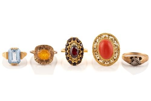 Lot 224 - A collection of five gem-set dress rings;...