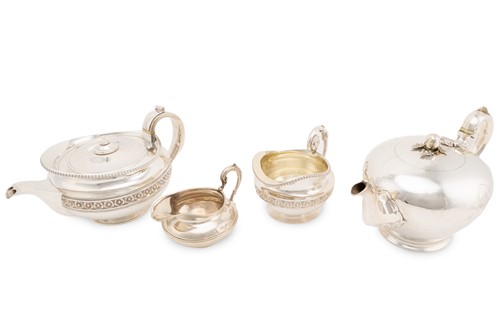 Lot 428 - A George III heavy silver teapot and milk jug,...