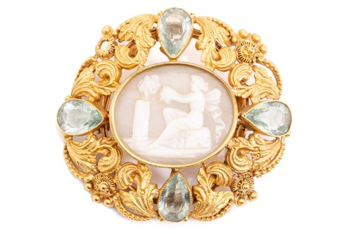 Lot 63 - A shell cameo brooch depicting a Classical...
