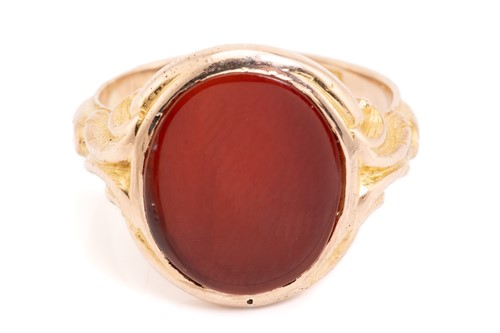 Lot 83 - A carnelian signet ring in 15ct gold, oval...