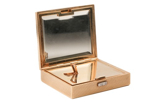 Lot 285 - Cartier - A 9ct gold vanity case, of...