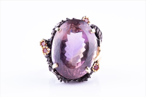 Lot 493 - An unusual ametrine and oxidised silver ring...