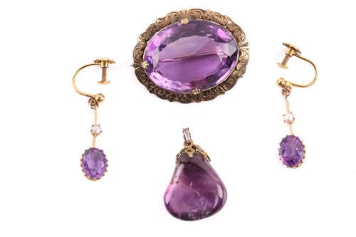 Lot 112 - An amethyst brooch, a pendant and a pair of...
