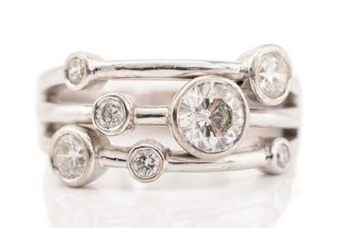 Lot 171 - An 18ct gold diamond ring in Raindance-styled...