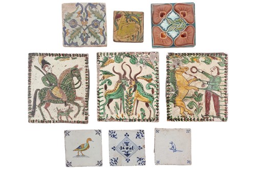 Lot 212 - A collection of pottery tiles, comprising...