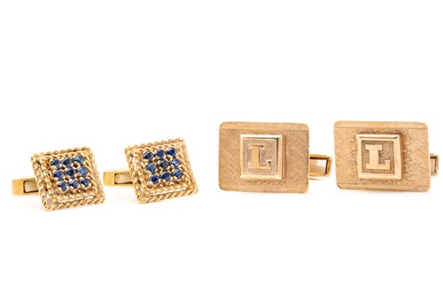 Lot 59 - A pair of 18 carat gold and sapphire cufflinks;...