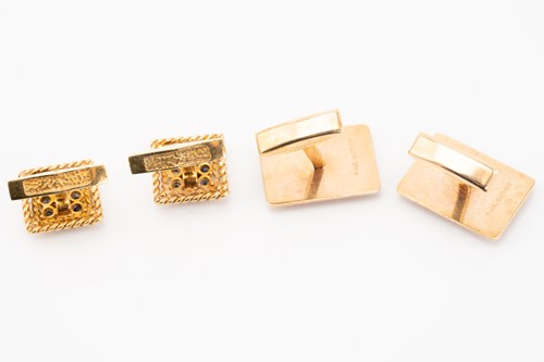 Lot 59 - A pair of 18 carat gold and sapphire cufflinks;...