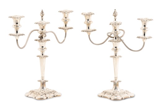 Lot 543 - A pair of 20th-century silver three-sconce...