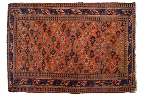 Lot 180 - A Caucasian rug with overall star decoration...