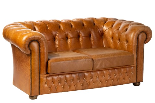 Lot 144 - A traditional leather Chesterfield two settee,...