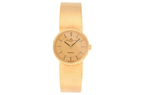 Lot 371 - A Baume & Mercier Baumatic gold lady's watch,...