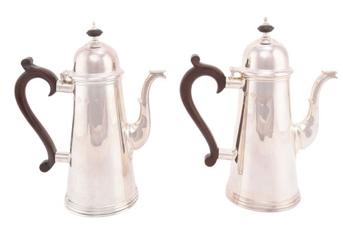 Lot 460 - A pair of 20th century silver coffee pots,...