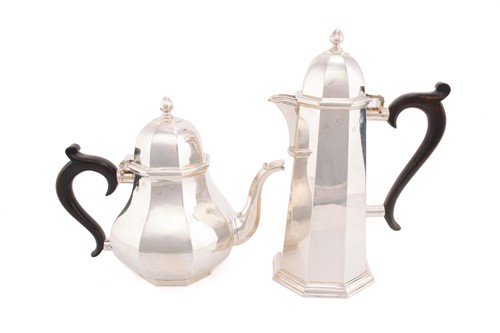 Lot 486 - A 20th century matching silver teapot and hot...