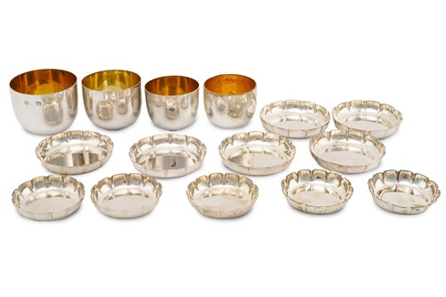 Lot 531 - A set of three graduated silver tumblers,...