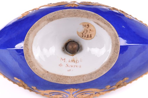 Lot 190 - A Sevres porcelain Empire design eagle-headed...