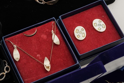 Lot 23 - A collection of silver jewellery; including...