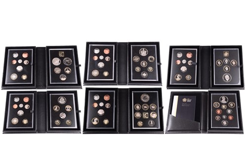 Lot 242 - A collection of boxed Royal Mint proof coin...