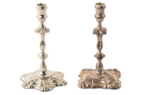 Lot 545 - A pair of associated silver candlesticks,...