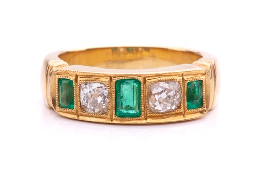 Lot 144 - A five-stone emerald and diamond dress ring,...