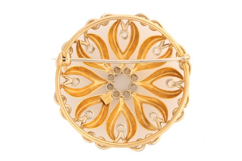 Lot 6 - A continental scrollwork brooch embellished...