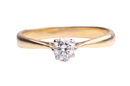 Lot 201 - A single stone diamond ring; the round...