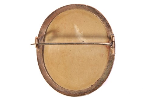 Lot 36 - A Victorian lava cameo demi-parure; comprising...